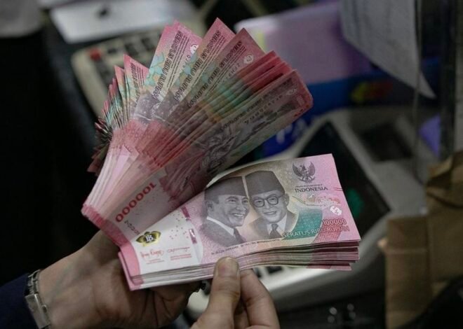 Rupiah Dibuka Melemah, Tembus Rp18.099 per Dolar AS