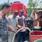 Tim Pembina Samsat Martapura Salurkan Air Bersih untuk Warga Aluh-Aluh melalui Samsat Peduli